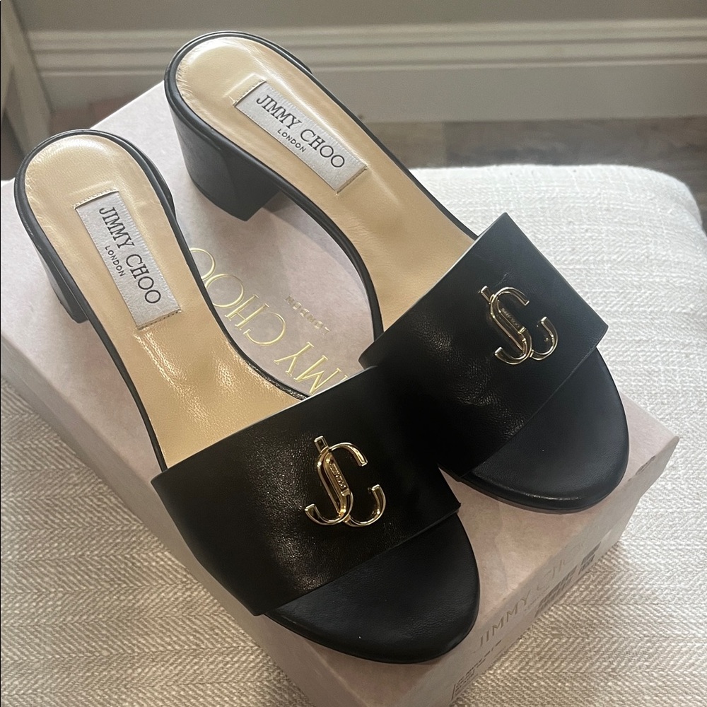 Jimmy Choo Black Mules with Gold Logo